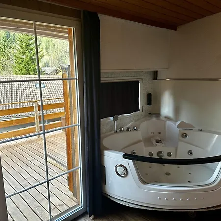 阿德勒小屋酒店